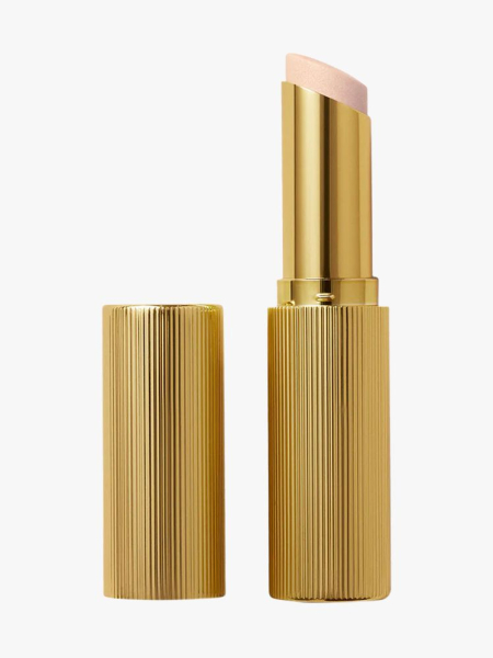 Victoria Beckham Beauty Reflect Highlighter Stick in branded component on a light gray background